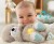 FISHER-PRICE Schlafender Otter mit beweglichem Bäuchlein, Sound &amp; Licht