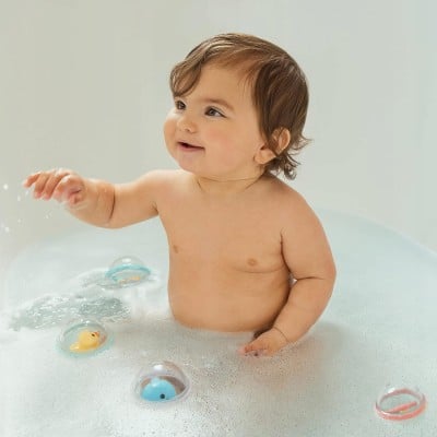 MUNCHKIN Float &amp; Play Bälle mit Rasseln für die Badewanne 4 Stück